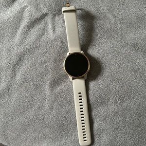 Garmin Venu (original version) rose gold with tan band